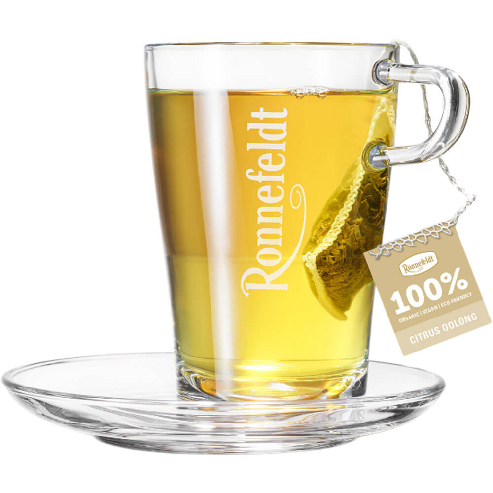 Ronnefeldt Citrus Oolong bio im Glas mit Premium Teebeutel und hellem goldgelbem Aufguss