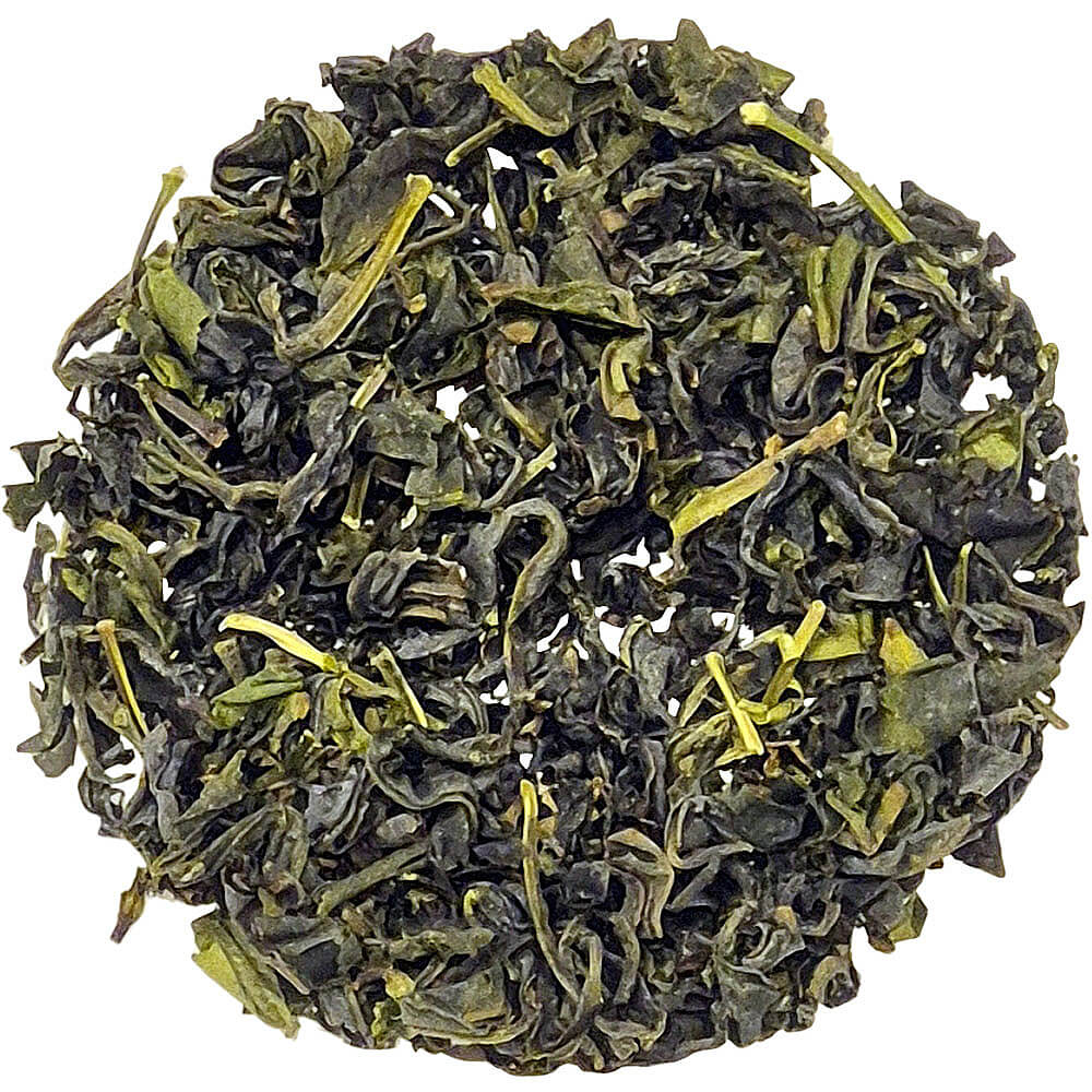 Loser Shin-Ryū Oolong bio mit leicht gedrehten Blättern in grünlich-dunklen Nuancen auf hellem Hintergrund