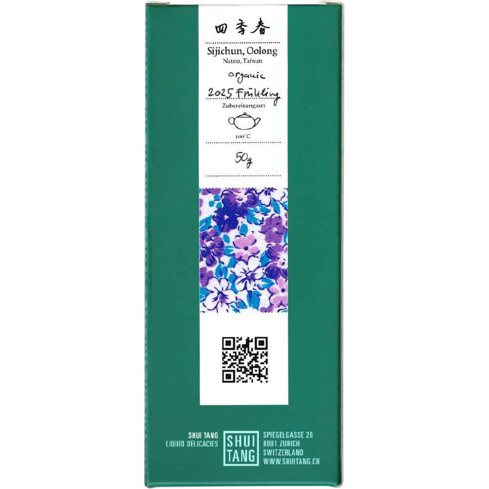 Grüne Verpackung fürSijichun-Oolong aus Nantou, Taiwan, mit weißem Mittelstreifen, floraler Illustration in Lila und Blau sowie handschriftlicher Aufschrift „2025 Frühling“.  Shui Tang Logo. 50g#packung_50g