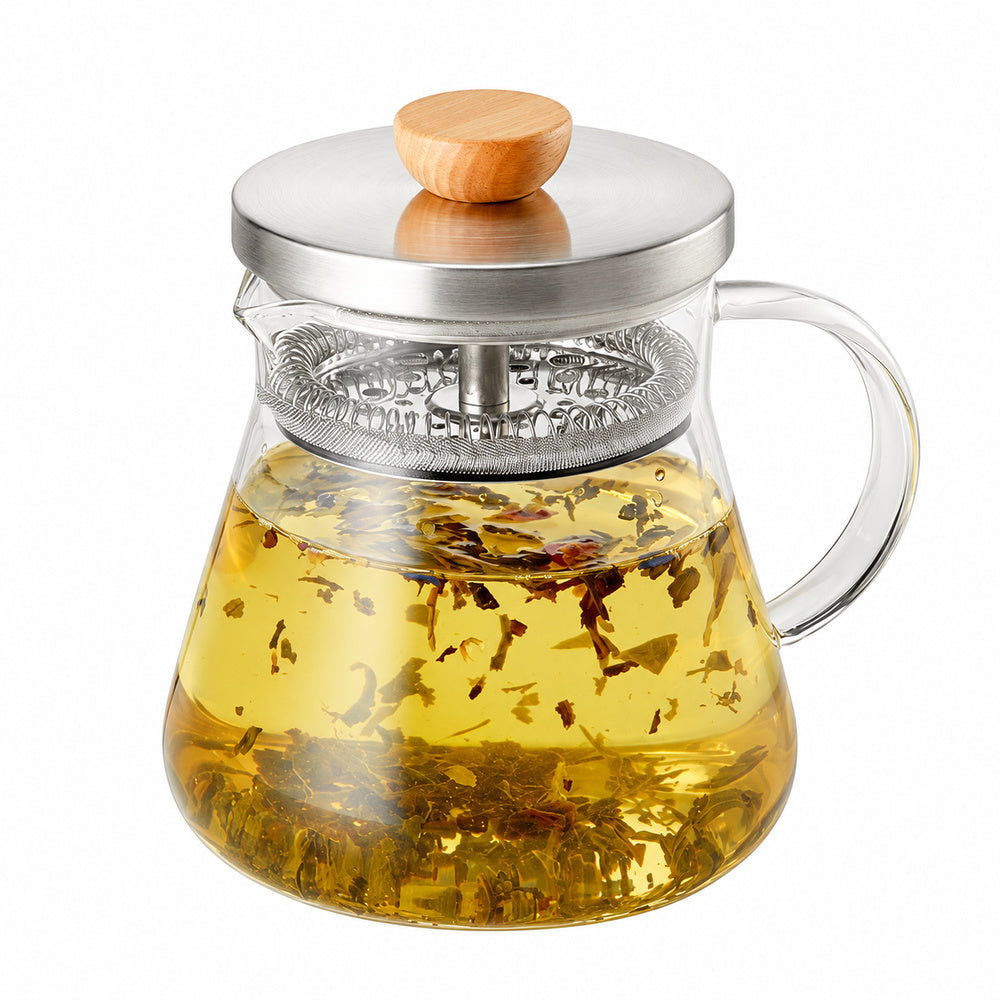 Gläserner Tee-Zubereiter Yorick mit goldenem Tee, losen Teeblättern und Edelstahlfilter